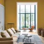 Kleur Modern Klassiek Amber muurverf in de woonkamer